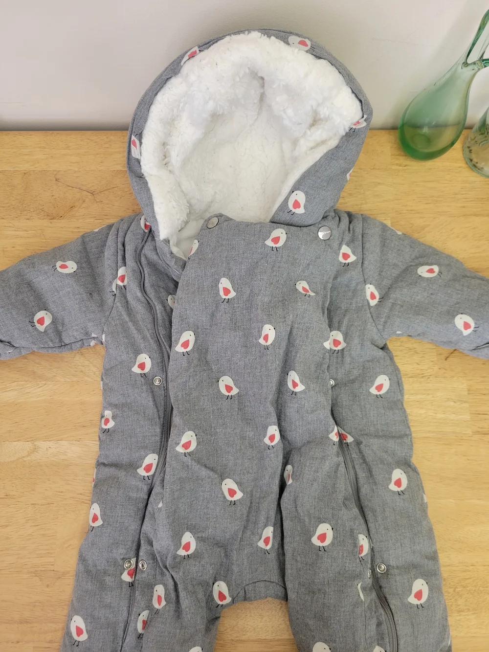 Gray Jacadi Paris infant snowsuit featuring a red and white bird pattern 12m